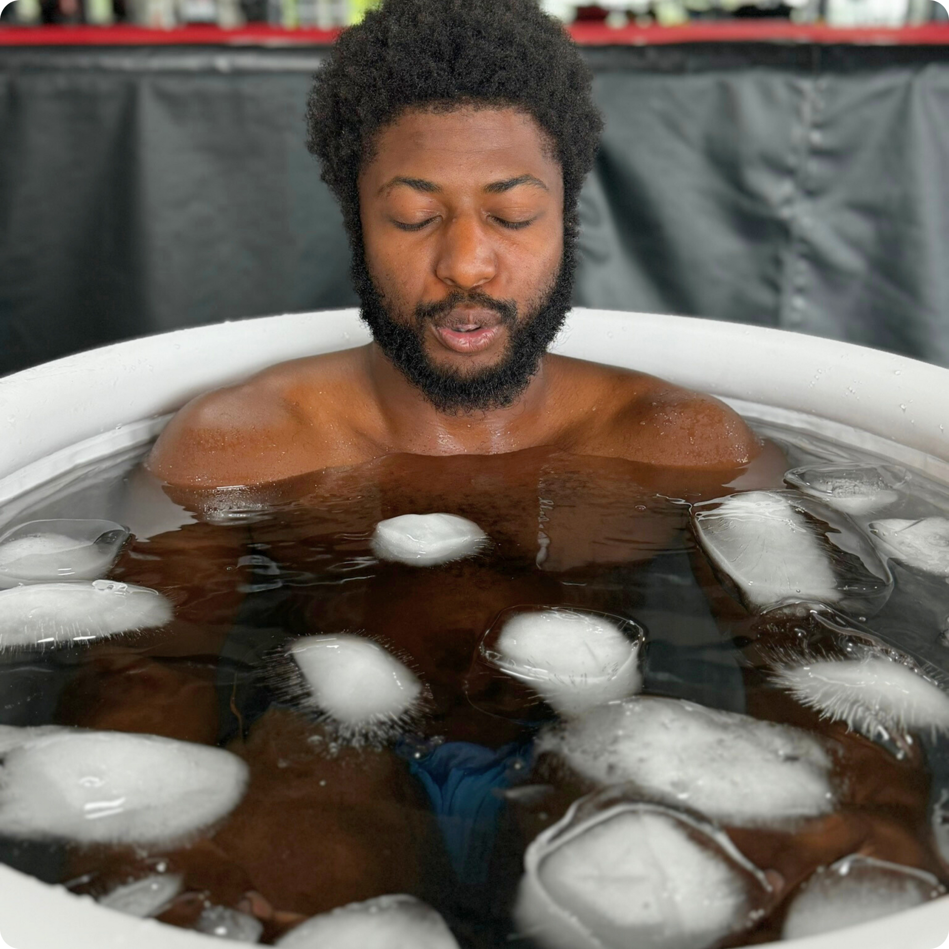 A man immerses himself in the Kotka Cold Pod for cold therapy.