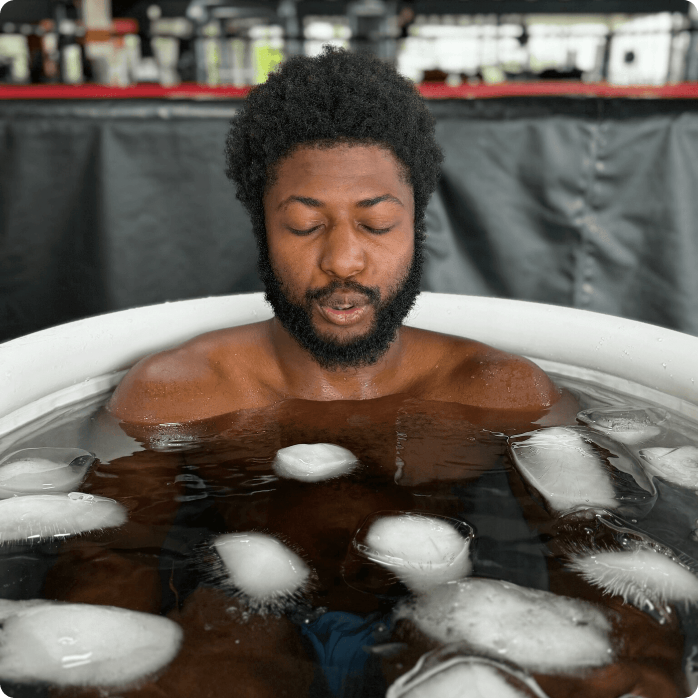 A man immerses himself in the Kotka Cold Pod for cold therapy.